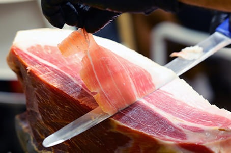 Découpe de jambon italien