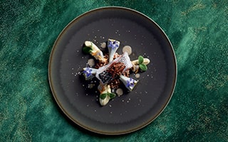 Recette de chef – Bar de ligne, artichaut, sarrasin, coquillages – Rodolphe Regnault