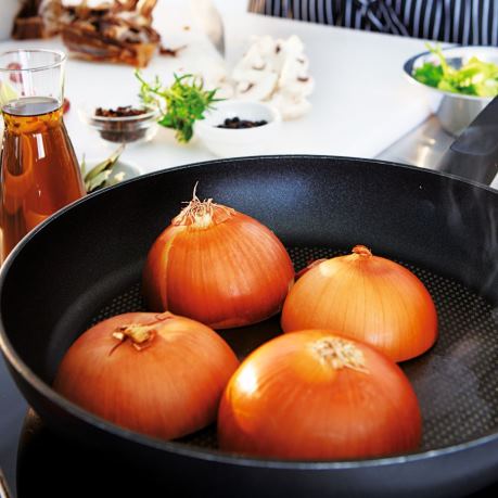 Ceapa jumatati gatita la tigaie