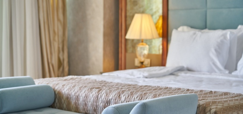 Essential amenities in a hotel room: Luxurious bedding and pillows